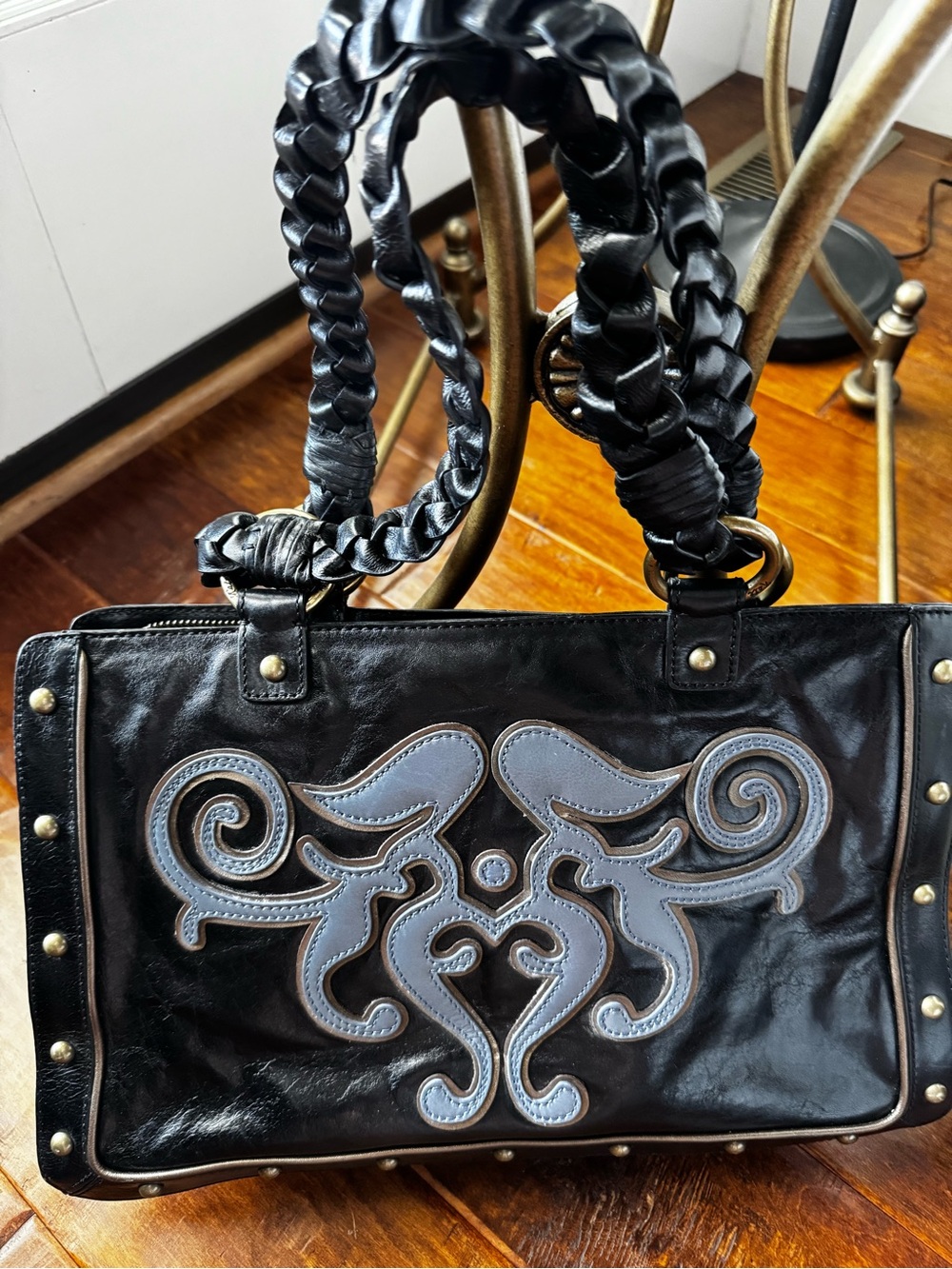 Kate Landry Black Leather Handbag with Decorative Gray Appliqué